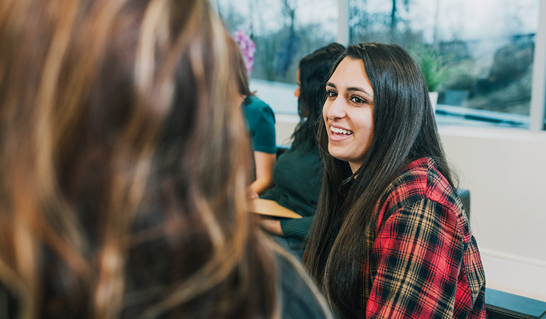 Woman talking to another woman in a group session at The Counseling Center At Millbury